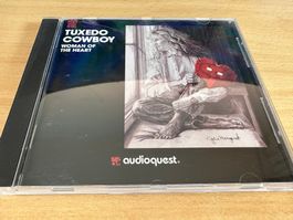 Tuxedo Cowboy – Woman Of The Heart