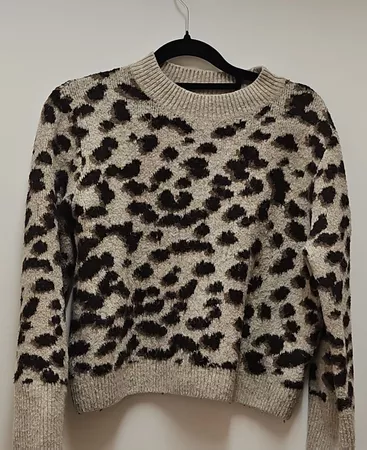 Damenpullover Leopardendruck beige braun verwendet