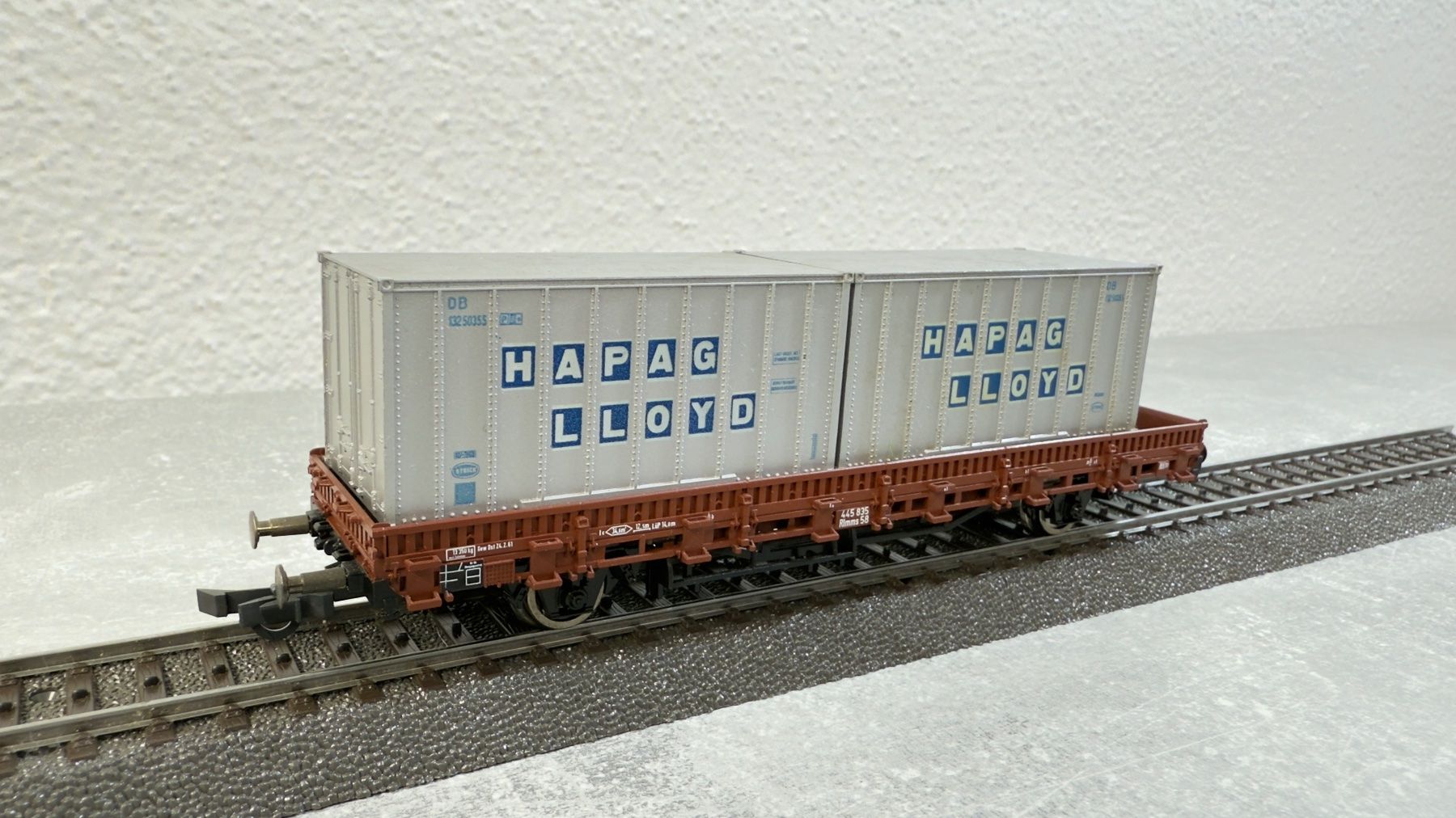 Roco Modellini di ferrovie: Roco Flachwagen mit HAPAG LLOYD Ladung H0 / AC – Usato da Schlieren venduto da rat_lq6b