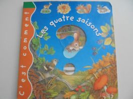 " les quatre saisons " livre cartonné avec fenêtres