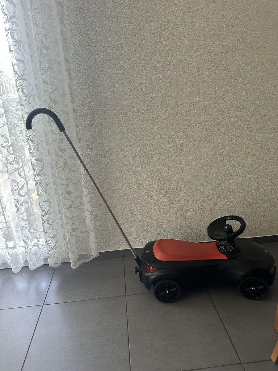 BMW Veicoli per bambini: Rutscherauto BMW  schwarz/orange mit Schiebestange – Usato da Triengen venduto da nes_l8cj