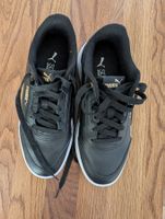 schwarze Puma Schuhe Gr 39