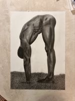 Charcoal drawing of athletic male figure on grass new