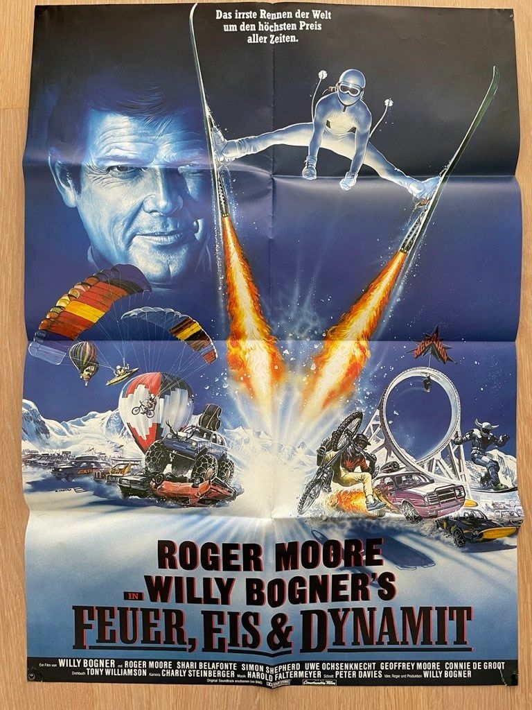 Poster & Bilder: Filmplakat Feuer, Eis und Dynamit Roger Moore VW Golf – Gebraucht aus Würenlos von SWISSOLDTIMERS