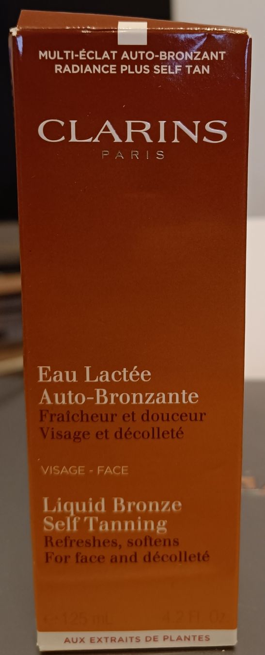 Clarins Cura del viso: Eau Lactée Auto-Bronzante 125 ml – Nuovo e nell'imballaggio originale da Genève venduto da Kamajan