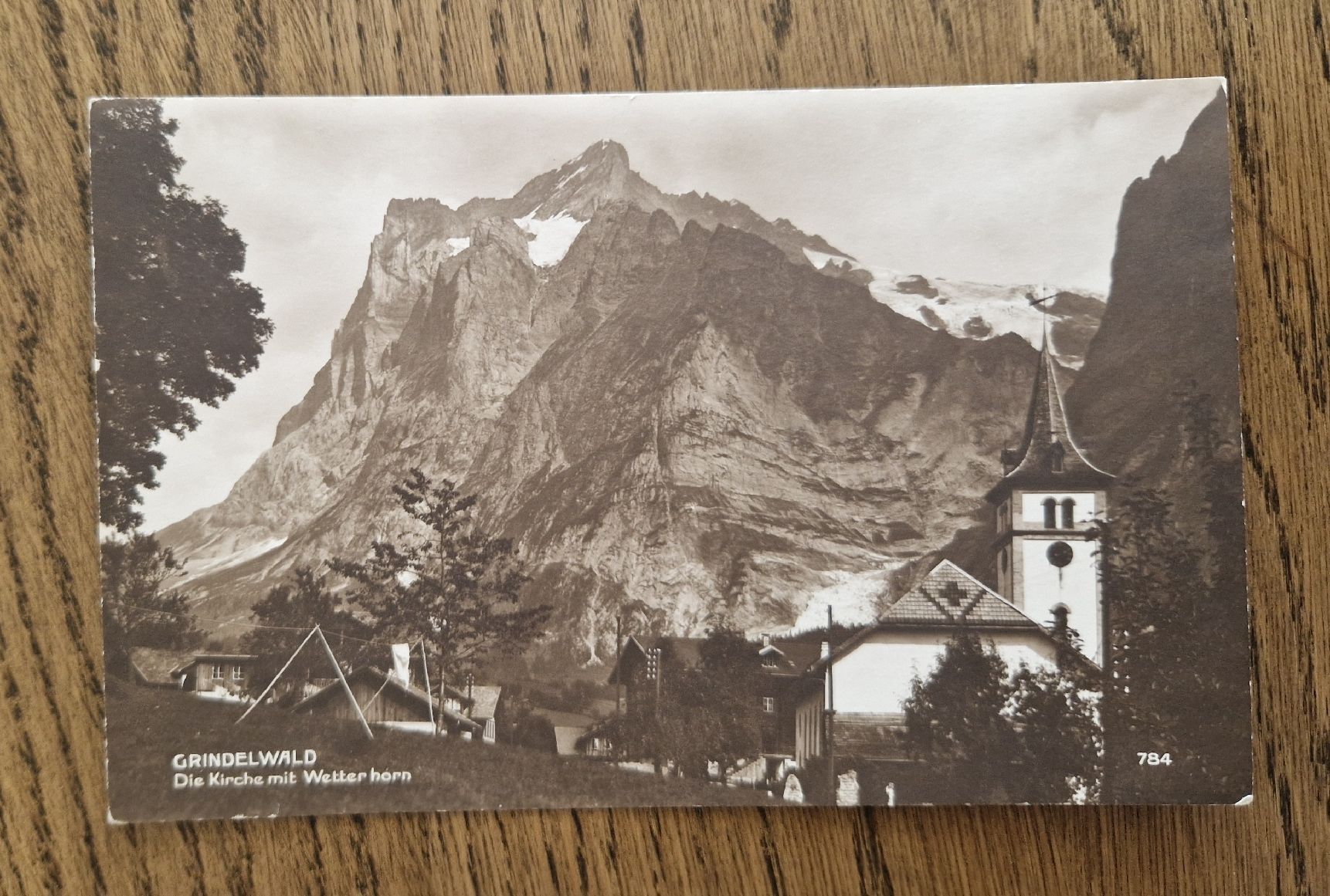 Cartoline postali: Grindelwald, Kirche mit Wetterhorn – Usato da Ebikon venduto da Donar50