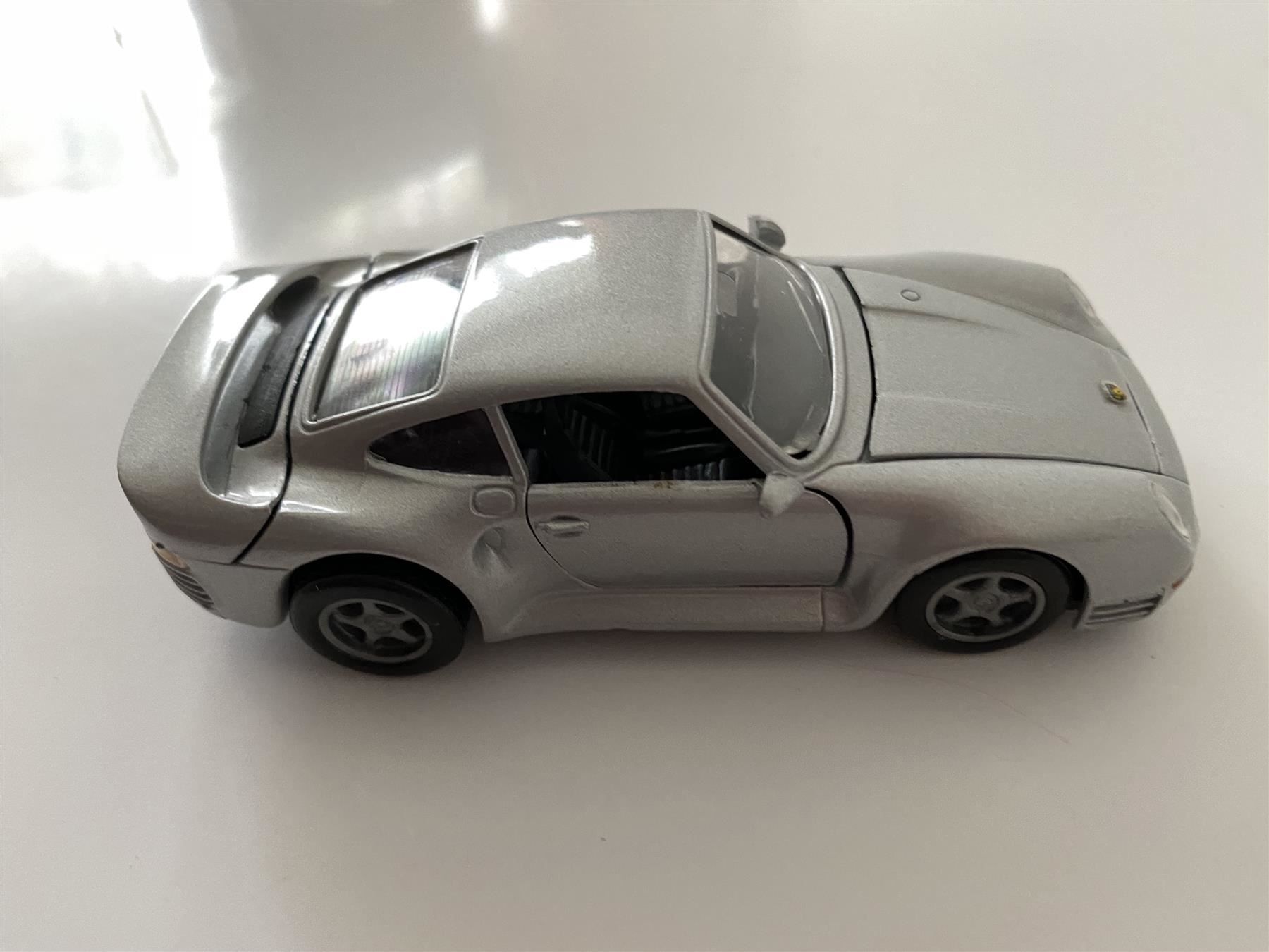 Porsche Modellini d'auto: Porsche 959 1-43 silber NZG BRD OVP – Nuovo e nell'imballaggio originale da Stäfa venduto da elcondor245 2
