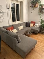 Ecksofa in Grau in gutem Zustand