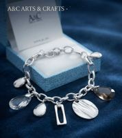 Exquisites Design Armband mit Charms - A&C Neu