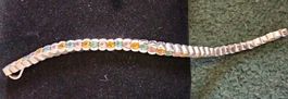 Pendentif long  argent. Joaillerie  avec  41 pierres.