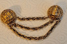 Broche double pour manteau