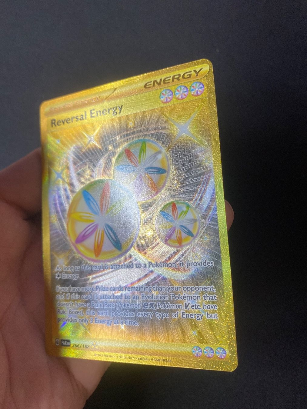 gold reversal energy pokemon card nergie Inversion (Reversal Energy) 266/182 Shiny - Ultraboost X carlate et Violet 4 Choose a basic Energy attached to 1 of your Pokemon and move it to another of your Pokemon Reversal Energy Gold 266 Wandel-Energie