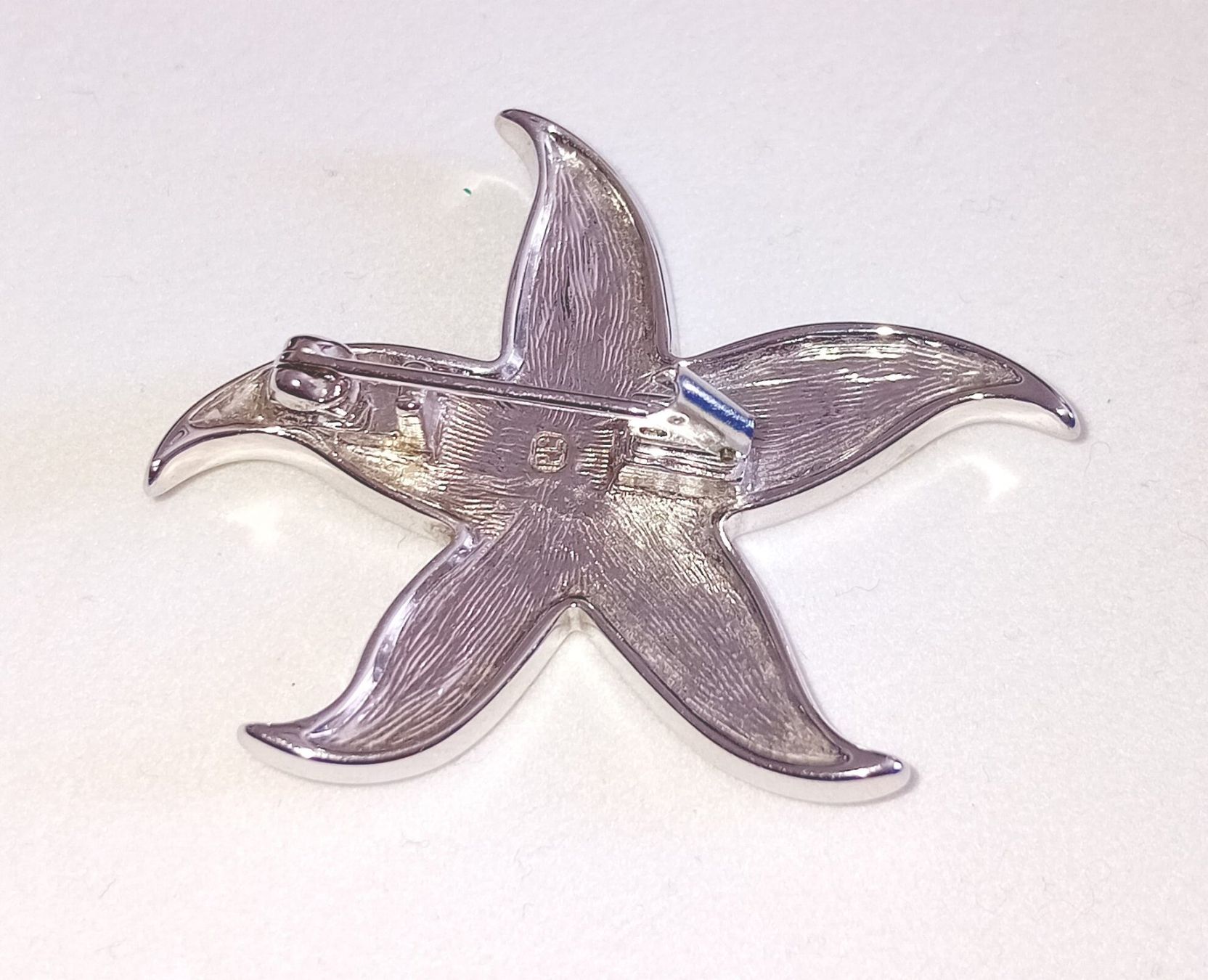 Pierre Lang Catenine: Collier / broche étoile argenté Pierre Lang - acier – Usato da Neuchatel venduto da Vlenoble 2