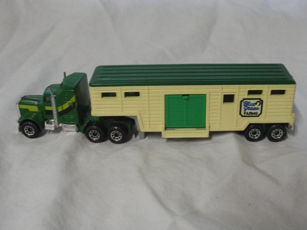 Matchbox Voitures modèles: MATCHBOX  KENWORTH WITH LOW BED TRAILER 1981 UNBESPIELT – D'occasion à Gurtnellen par Murmeli99 1