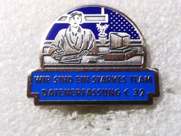 Ansteckpin 129: Datenerfassung C 32 - Starkes Team