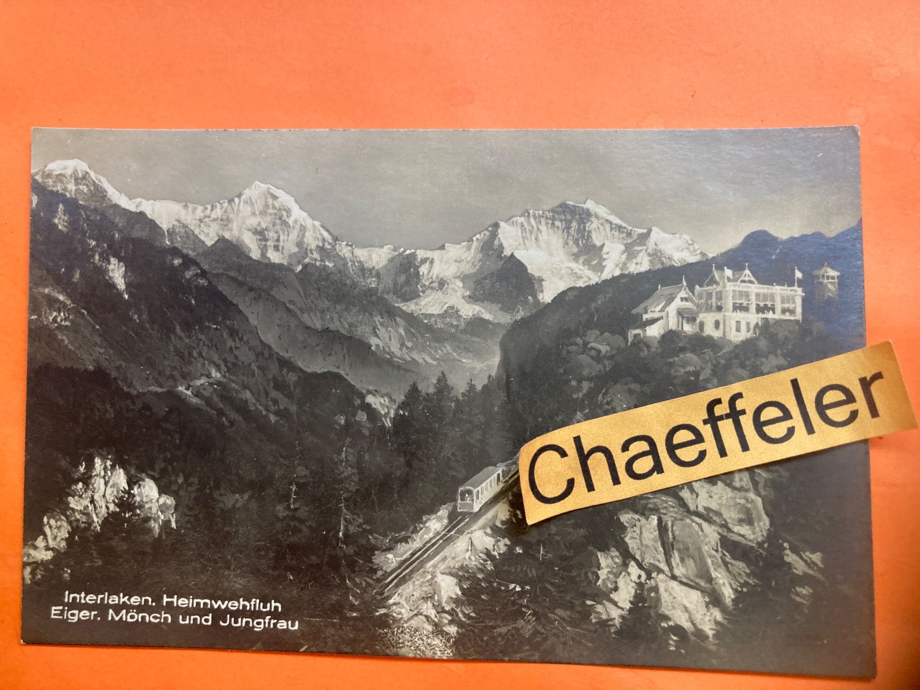 Ansichtskarten: Interlaken, Heimwehfluh.  Eiger, Mönch und Jungfrau – Gebraucht aus Zürich von Chaeffeler