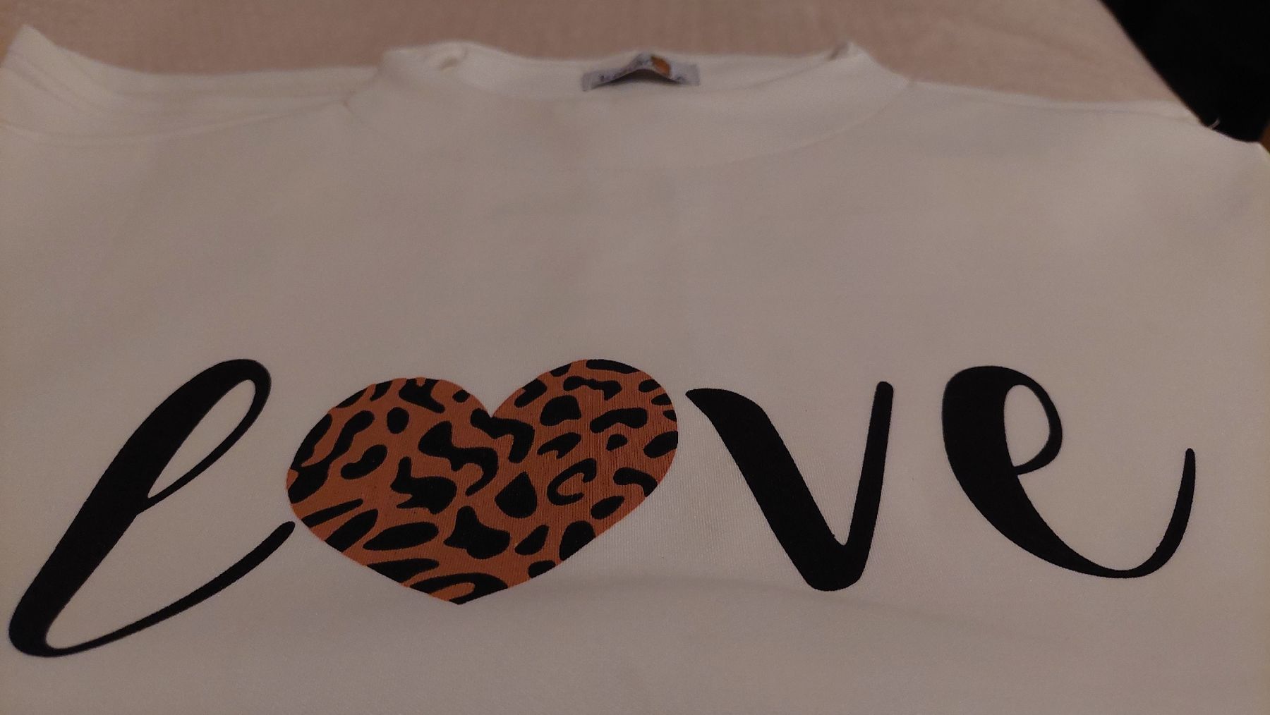T-Shirts: Tshirt mit Schrift/neu – Neu und originalverpackt aus Basel von O-MEGA 1