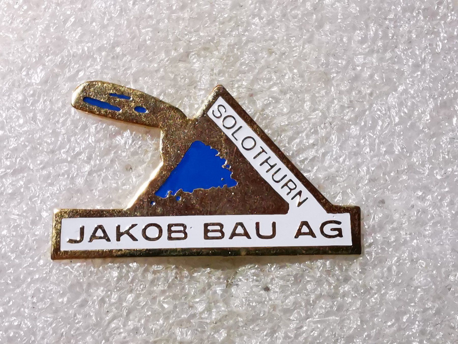 Placchette & Badge: Ansteckpin 77: Jakob Bau AG – Usato da Oppligen venduto da Pin-Fall-Shop