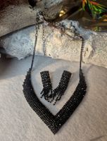 Set collana e orecchini neri con strass nuovo stato