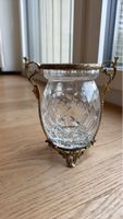 Crystal vase with ornate handles, used