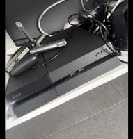 PlayStation 4 with 5 Games and 2 Controllers