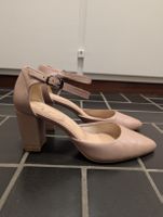 Elegante beigefarbene Lederpumps 41