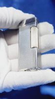 Dunhill antikes Benzin Feuerzeug silbern im gutem Zustand.