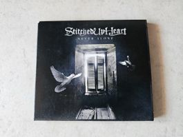 Stitched Up Heart  -  Never Alone
