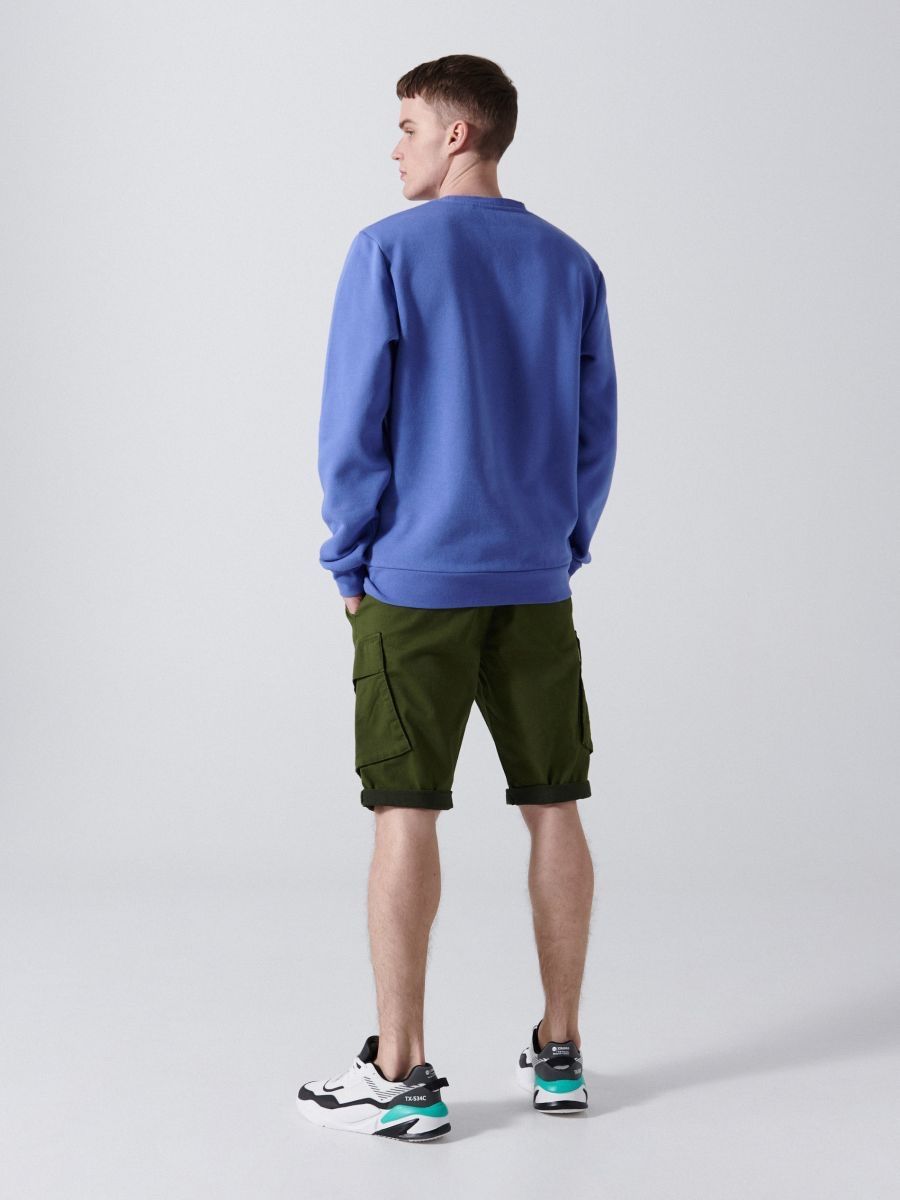 Pulls & Sweat-shirts: Cropp sweatshirt The Joker size:M 300$ – D'occasion à Lausanne par Nat_Sha 2
