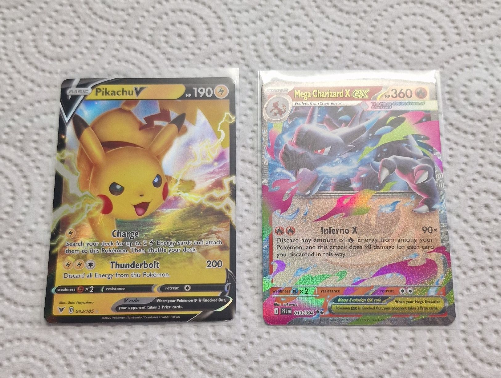 Pokémon Cartes à collectionner: Pokemon - Pikachu V + Mega Charizard X EX En ab 1.- – Neuf (Voir description) à amriswil par 3dworldswiss