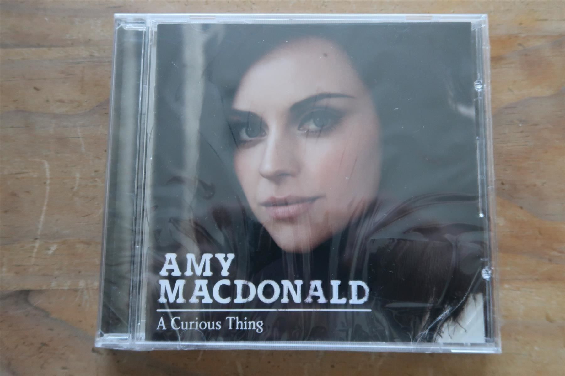 CDs: AMY MACDONALD - A CURIOUS - NEUE CD OVP – Neu und originalverpackt aus Basel von Patiscat