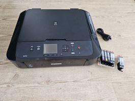 Canon Tintenstrahldrucker mit Patronen und Fotopapier