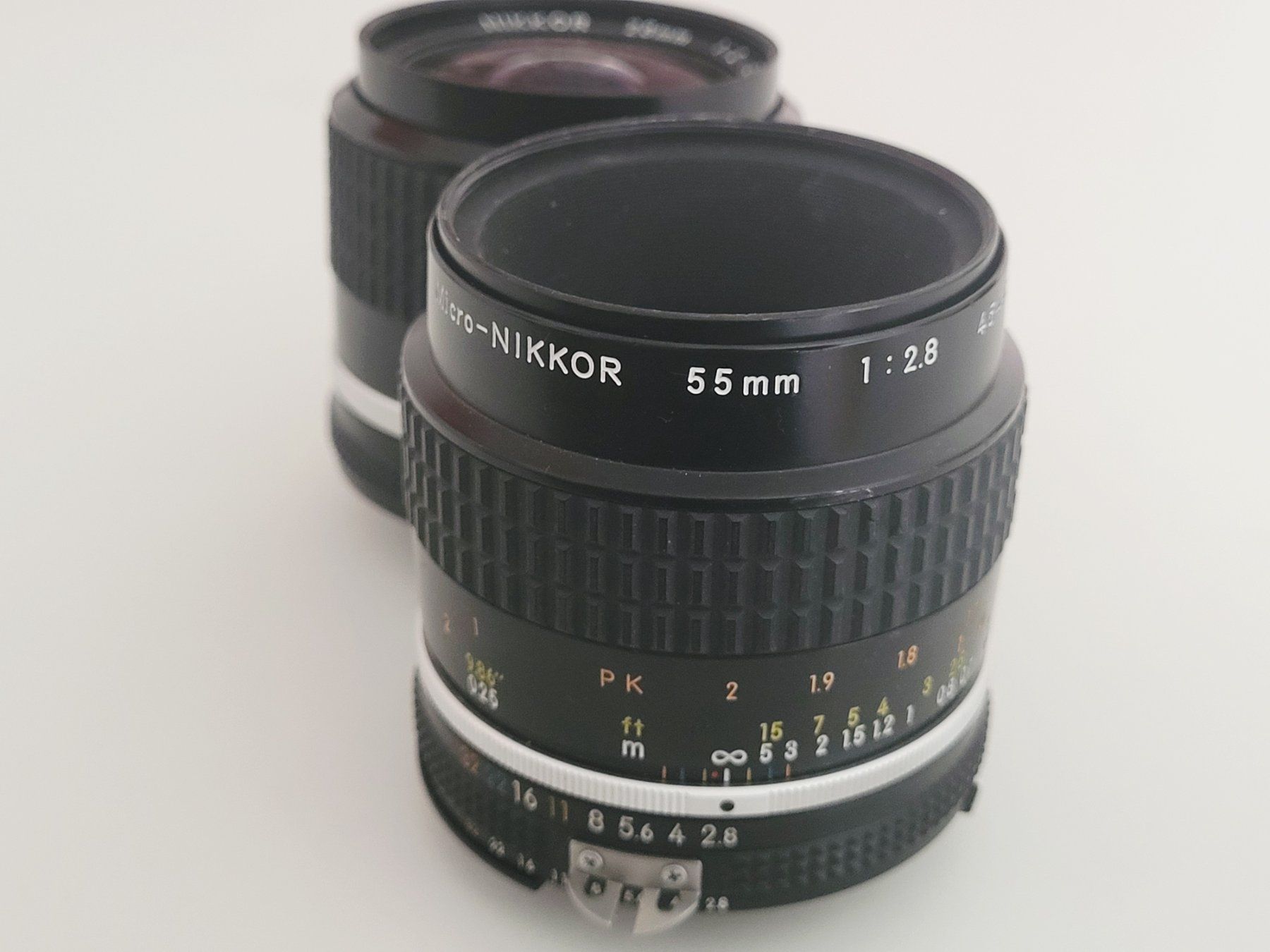 Nikkor Objektive: 2 Nikkor 28mm und 55 mm – Defekt aus Bern von Chalon1826 2