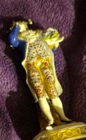 Figurine en porcelaine homme fleur bon état