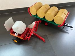 Ballenwickler, Ballentransportanhänger mit Ballen (Bruder)