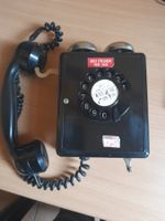 Altes Wandtelefon mit Wählscheibe "Bei Feuer Nr. 118"