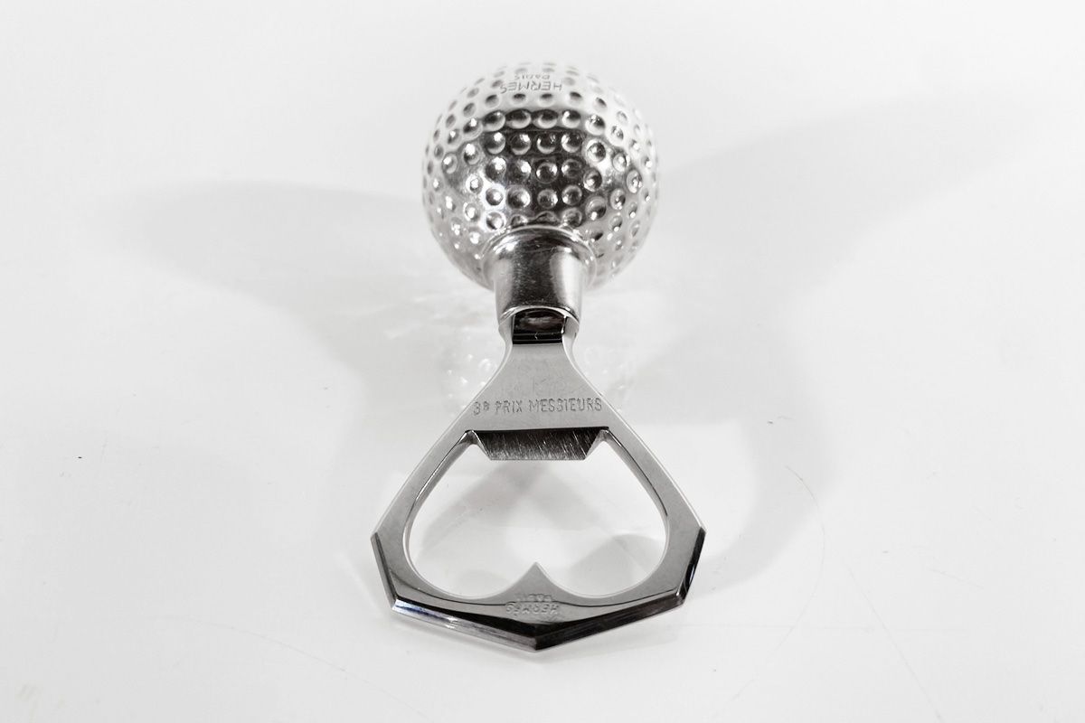 Hermès Apribottiglie & Tappi per chiusura: Golfball Flaschenöffner von Hermes Paris – Usato da Ballwil venduto da ClassicGallery