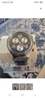 Montre Swatch Irony Chrono YCS553G cadran bleu acier