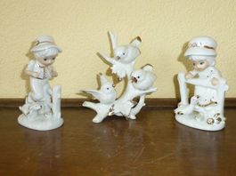 Porzellanfiguren Bube Mädchen Vögel