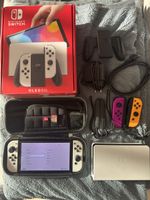 Nintendo Switch OLED Weiss + 4 Joy-Con + Mario Kart 8 Deluxe