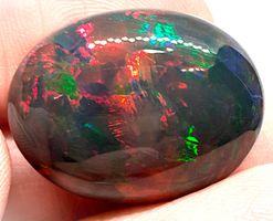 Opale noire ovale 28.47 ct - 27x22 mm CERTIFICAT 1'135.- Fr