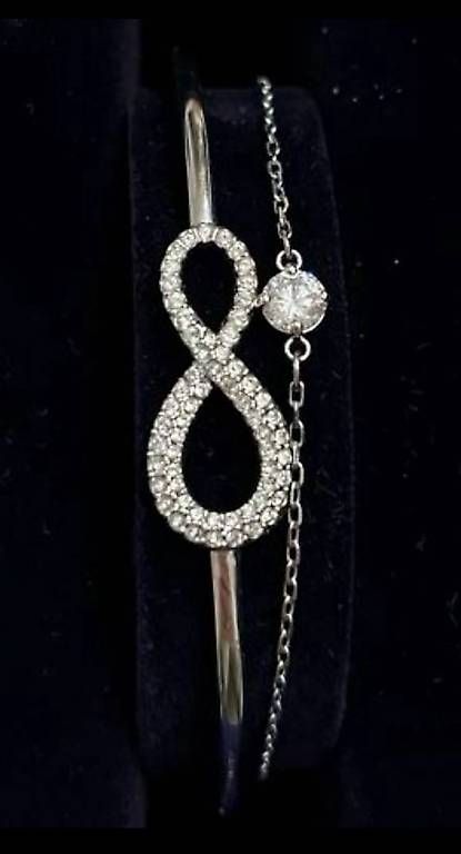 Bracciali & Braccialetti: Swarovski Armband Infinity fast NEU  – Usato da Kloten venduto da Privat2011