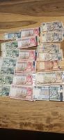 une collection de billets Rial omanais