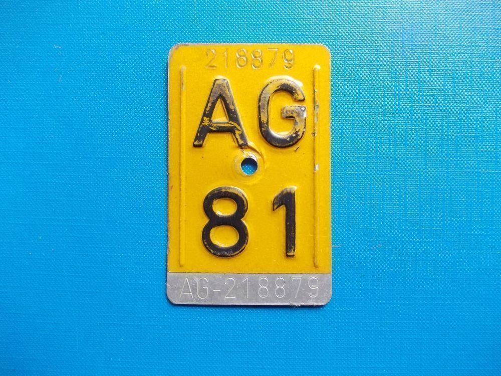 Insegne: Velonummer / Mofanummer / Töfflinummer AG 81 – Usato da Gsteigwiler venduto da HORMIGA21