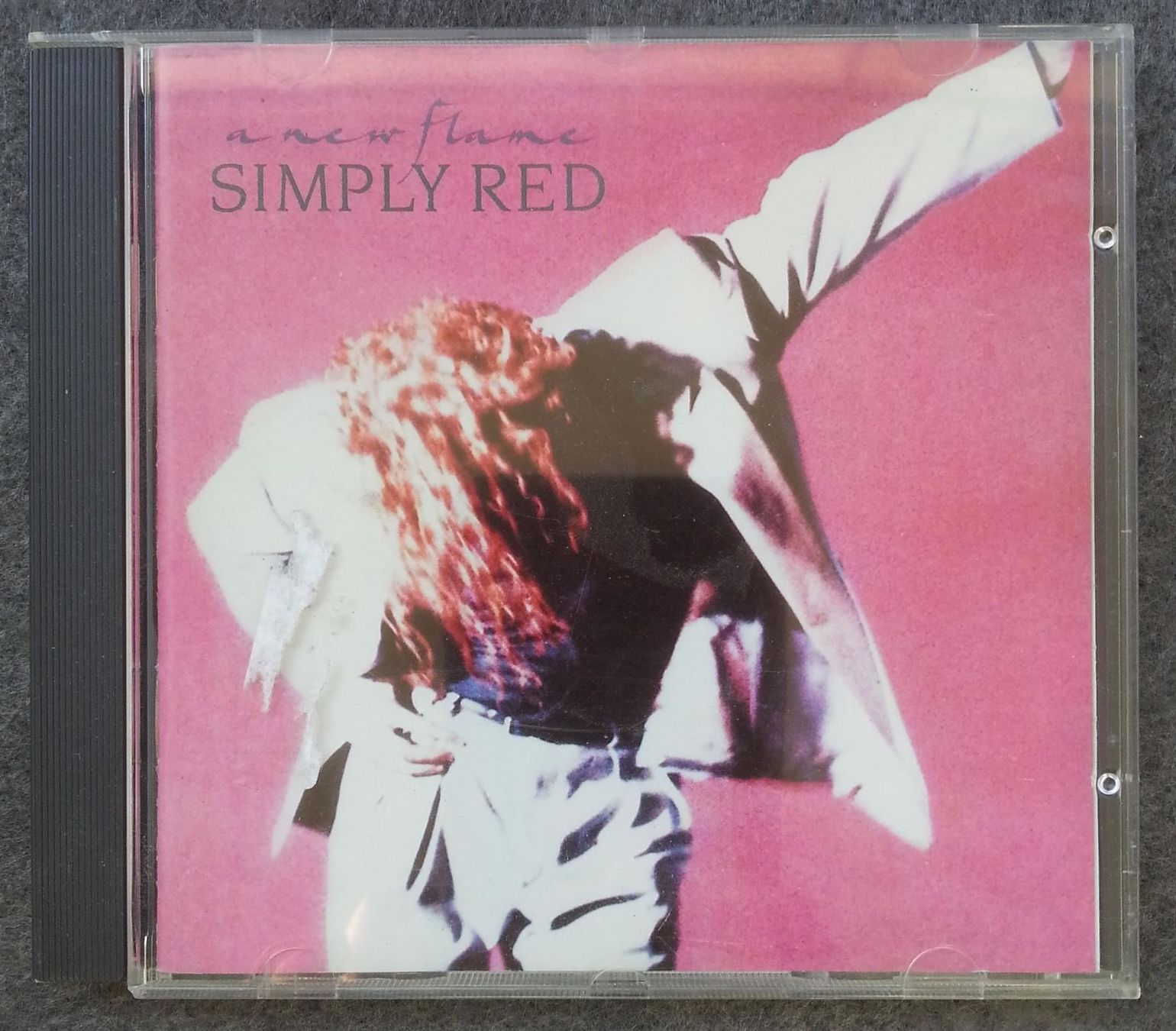 CD: CD SIMPLY RED "a new flame", Rock 1989 – Usato da Oberriet SG venduto da ganesh435