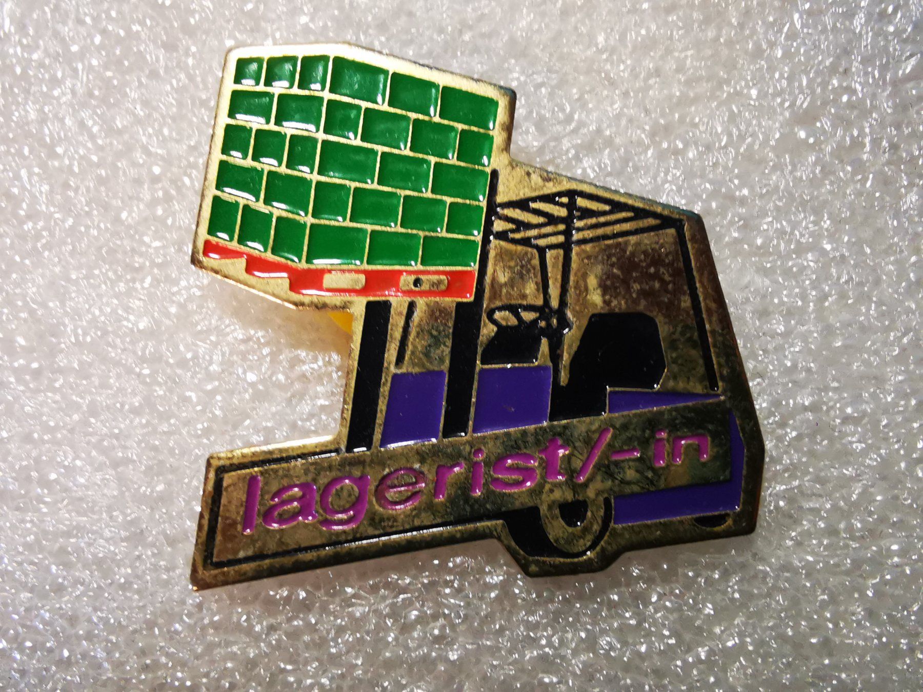 Placchette & Badge: Ansteckpin 8: Lagerist/in – Usato da Oppligen venduto da Pin-Fall-Shop