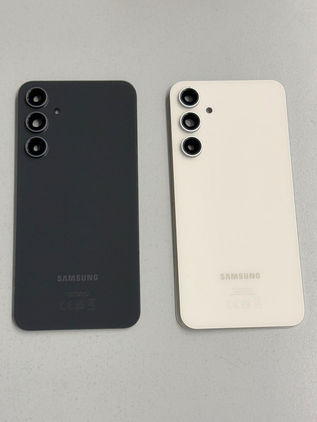 Samsung Telefoni cellulari / Smartphones: Vitre arrière Originale Samsung S24 Fe Graphite Galaxy – Usato da Zug venduto da ElPhone 1