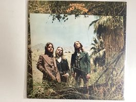 America LP - Hat Trick