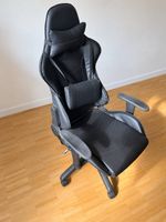 Gamingstuhl schwarz mit Kissen – Rolle locker, Reparatur