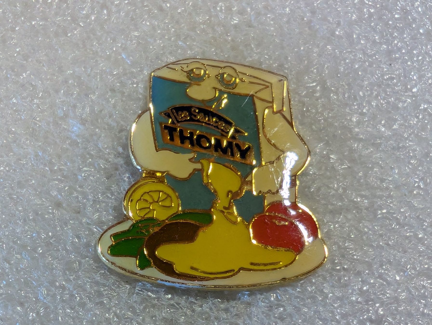 Placchette & Badge: Ansteckpin 102: Thomy – Usato da Oppligen venduto da Pin-Fall-Shop